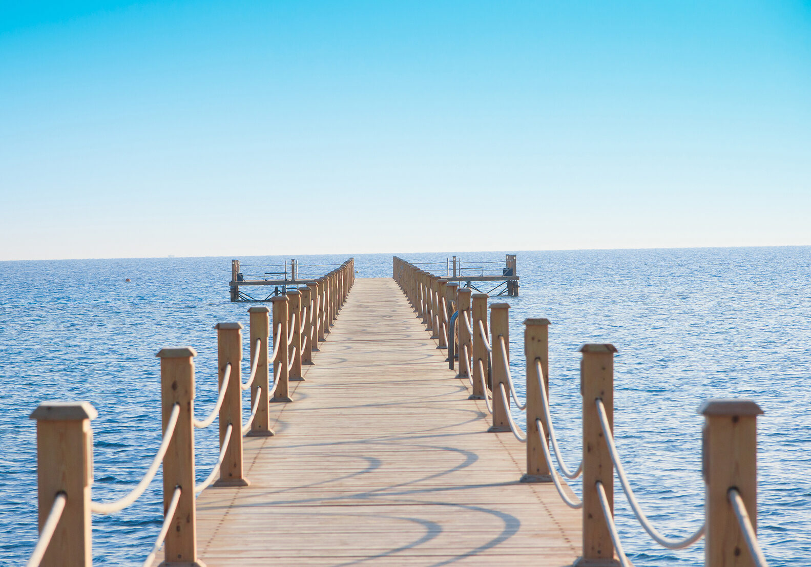 bigstock-Pier-over-Waters-15972611.jpg